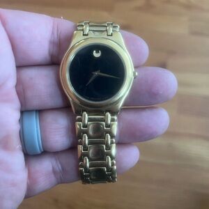 Movado museum watch 33mm black dial gold tone round